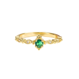 Exquisite gold-plated ring featuring a green round stone and marquise hollow design