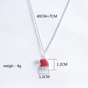 Detail view of rhinestone Christmas hat pendant with size specs and silver chain