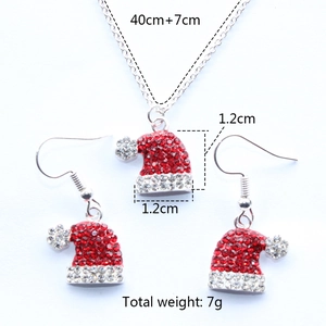 Detail view of rhinestone Christmas hat necklace and earrings set with measurements