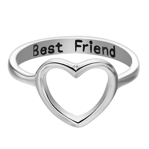 Polished silver hollow heart ring with Best Friend engraving on a white background