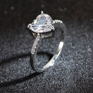 Exquisite heart-shaped cubic zirconia ring with micro-paved silver-plated band