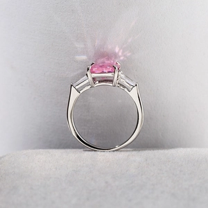 Elegant square pink zircon ring with side trapezoid diamonds and silver setting