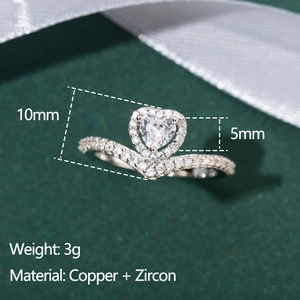 Elegant V-shaped silver ring featuring a sparkling heart zircon centerpiece for women