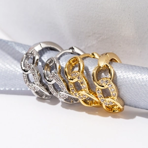 Exquisite 18K gold and silver chain earrings with pavé crystals on elegant silk