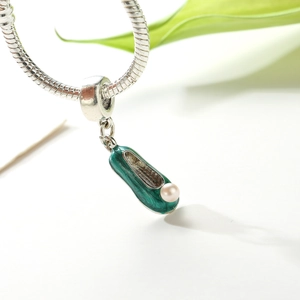Green enamel shoe pendant with white pearl on a silver snake chain jewelry accessory