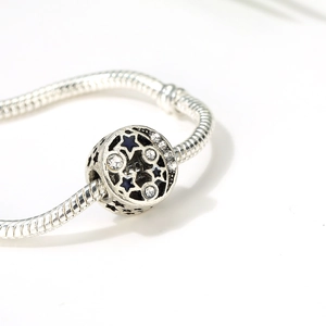 Bohemian silver snake chain bracelet with blue enamel star charm and clear zircons