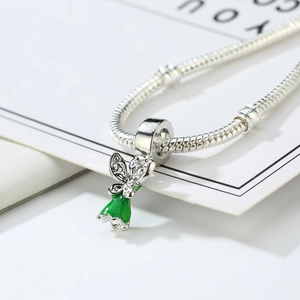 Silver fairy pendant with green enamel wings and dress on a classic snake chain