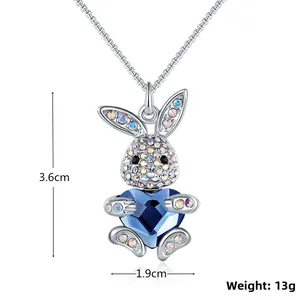 Detailed view of bunny pendant with blue heart crystal showing size 3.6x1.9cm and 13g weight