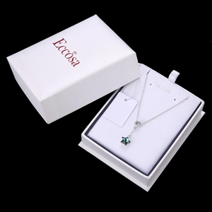 Blue star crystal necklace in silver chain displayed in a white gift box for women