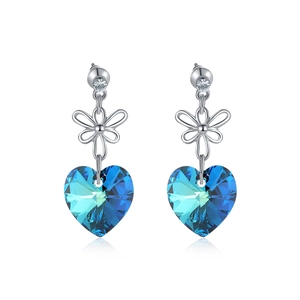 Vintage heart shaped blue crystal earrings with silver bow design and faceted gradient finish