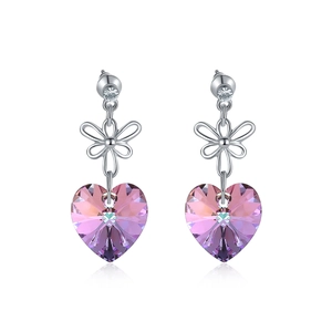 Elegant heart-shaped pink crystal earrings with silver flower detail and clear reflections