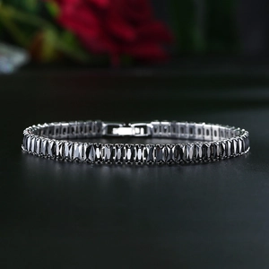 Silver tennis bracelet with rectangular black cubic zirconia stones in a claw setting