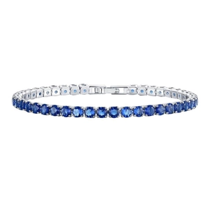Elegant silver tennis bracelet featuring circular blue zircon stones on a white background