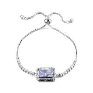 Detailed macro view of silver-tone slide bracelet with purple rectangular zircon and halo