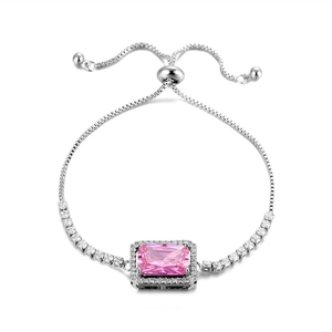 Close-up of adjustable silver bracelet featuring a rectangular pink zircon and cubic zirconia