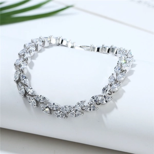 Elegant silver leaf bracelet with marquise-cut cubic zirconia in a willow branch design