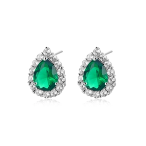 Macro detail of pear-cut emerald teardrop earring with halo of micro zircon stones