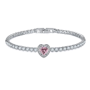 Detail of a luxury pink heart-shaped crystal tennis bracelet with cubic zirconia and fold-over clasp