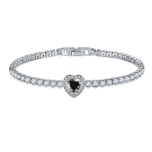 Detailed macro view of heart-shaped black zircon bracelet with silver-tone micro-paved stones