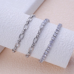 Three-piece silver chain bracelet set with oval links and sparkling cubic zirconia stones