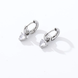 Detail of heart-shaped clear zircon drop earrings in S925 silver with leverback closure