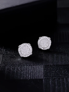 Macro shot of silver hip-hop earrings with micro-pave round zircon settings for men