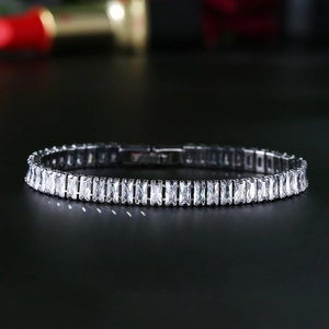Hip hop silver tennis bracelet with baguette cut cubic zirconia in a prong setting