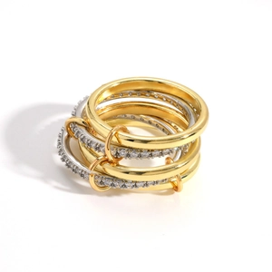 Minimalist hip-hop style stacked two-tone gold and silver ring set with zircon accents
