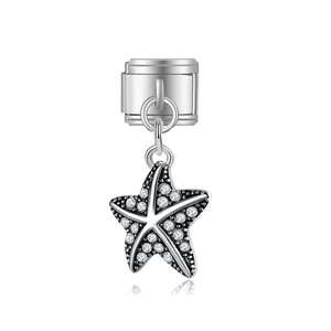 Vue macro de breloque étoile de mer en argent avec zircons pour bracelets modulaires