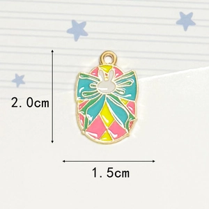 Detail view of colorful Easter rabbit basket pendant showing 2.0cm height and 1.5cm width