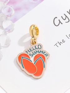 Close-up of orange flip-flop enamel pendant with Hello Summer text for DIY jewelry