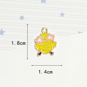 Detailed view of yellow enamel chick pendant with pink star glasses, 1.8cm height measurement