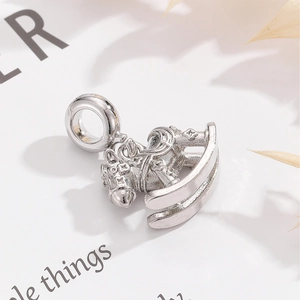 Silver rocking horse charm in 925 sterling silver with relief details for bracelets