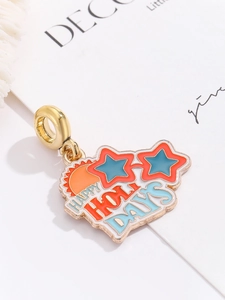 Macro detail of Happy Holidays enamel sun pendant for DIY jewelry and travel bracelets