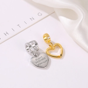 Elegant heart-shaped alloy charms in gold and silver with inspirational engraving and zircon