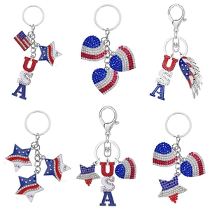 USA flag themed keychains with red, white, and blue rhinestones and star charms
