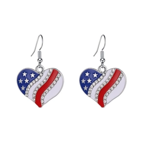 Detail of heart-shaped USA flag earrings with blue stars, red stripes and white rhinestones