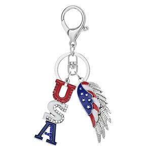 Detail of USA rhinestone letters and American flag wing charm on silver keychain