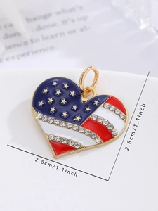 Detail of American flag heart charm with sparkling rhinestones and golden metal trim