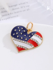 Close-up of heart-shaped American flag pendant with enamel finish and crystal inlay