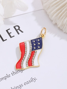 Macro view of US flag heart pendant with sparkling rhinestones and enamel details