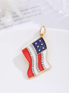 Detail of USA flag heart pendant with red white blue enamel and sparkling rhinestones