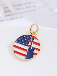 Macro view of US flag and Statue of Liberty enamel round charm with golden edges