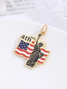 Detailed close-up of a 4th July American Independence Day metal charm with Statue of Liberty