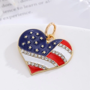 Heart-shaped USA flag charm with sparkling rhinestones and gold-plated finish for DIY jewelry