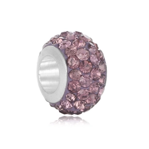 Macro detail of purple rhinestone charm bead with large hole for DIY jewelry making
