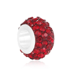 Macro shot of a red micro-pave crystal European bead with metal core for DIY bracelets