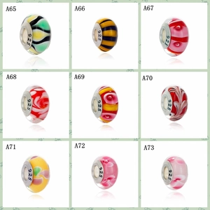 Collection of white glass charms with colorful patterns and 925 silver metal cores
