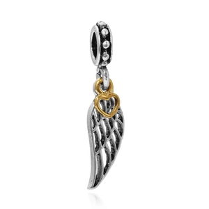 Bohemian silver wing charm with a small gold heart pendant and vintage beaded bail