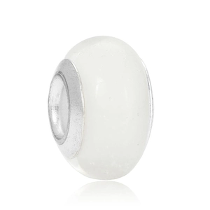 Macro view of milky white translucent glass charm bead with polished silver metal core